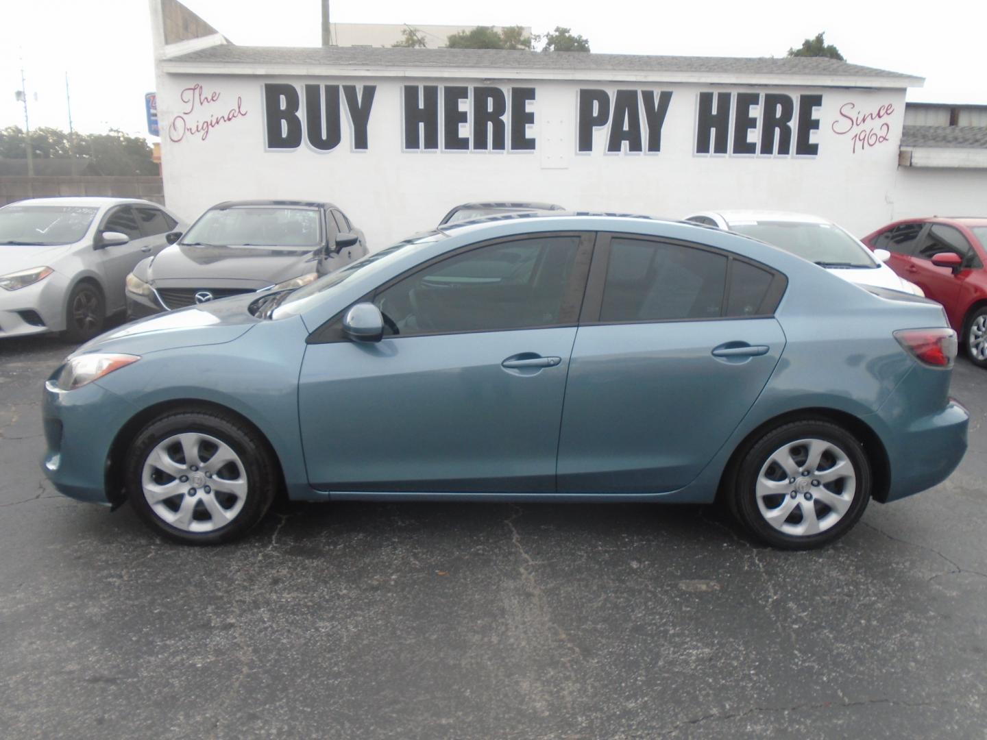 2012 Mazda MAZDA3 (JM1BL1UF0C1) , located at 6112 N Florida Avenue, Tampa, FL, 33604, (888) 521-5131, 27.954929, -82.459534 - Photo#0